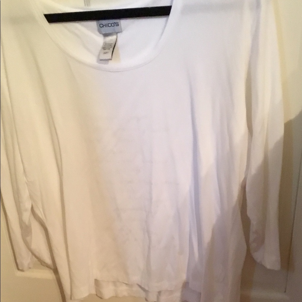 Chico’s t’shirt with faint writing on front.
